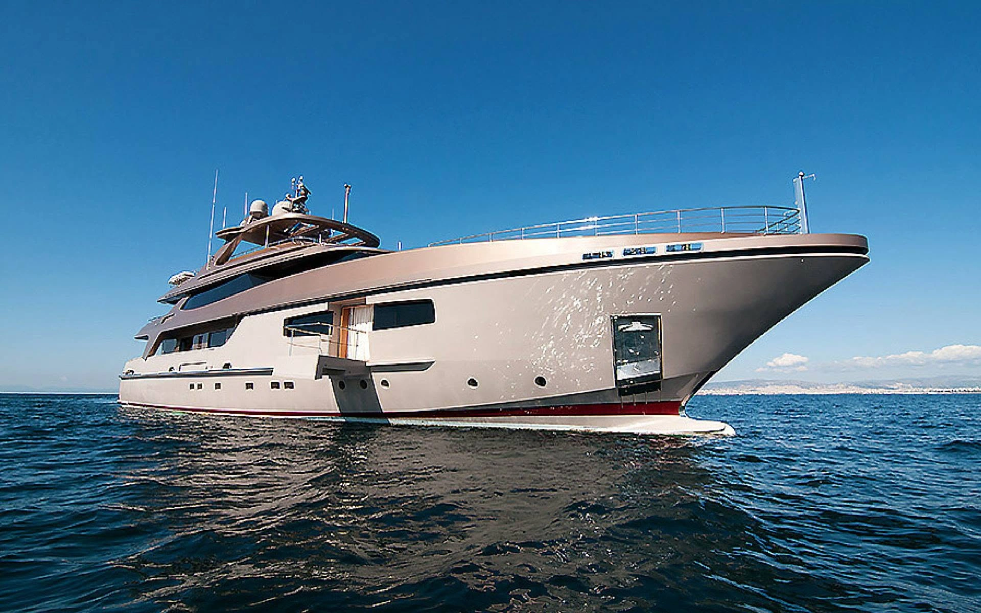 Motor yacht viewed from the water, supplied for the InvestorsAlly yacht collection